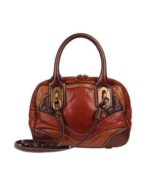 dolce gabbana brown purse dg all over|dolce and gabbana clutch bag.